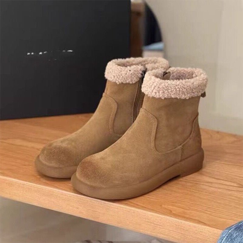 Doublure_isolante_en_fourrure_des_bottes_CozyStep_en_gros_plan.jpg CozyStep™ | Bottes d'Hiver Alliant Luxe - Image 1